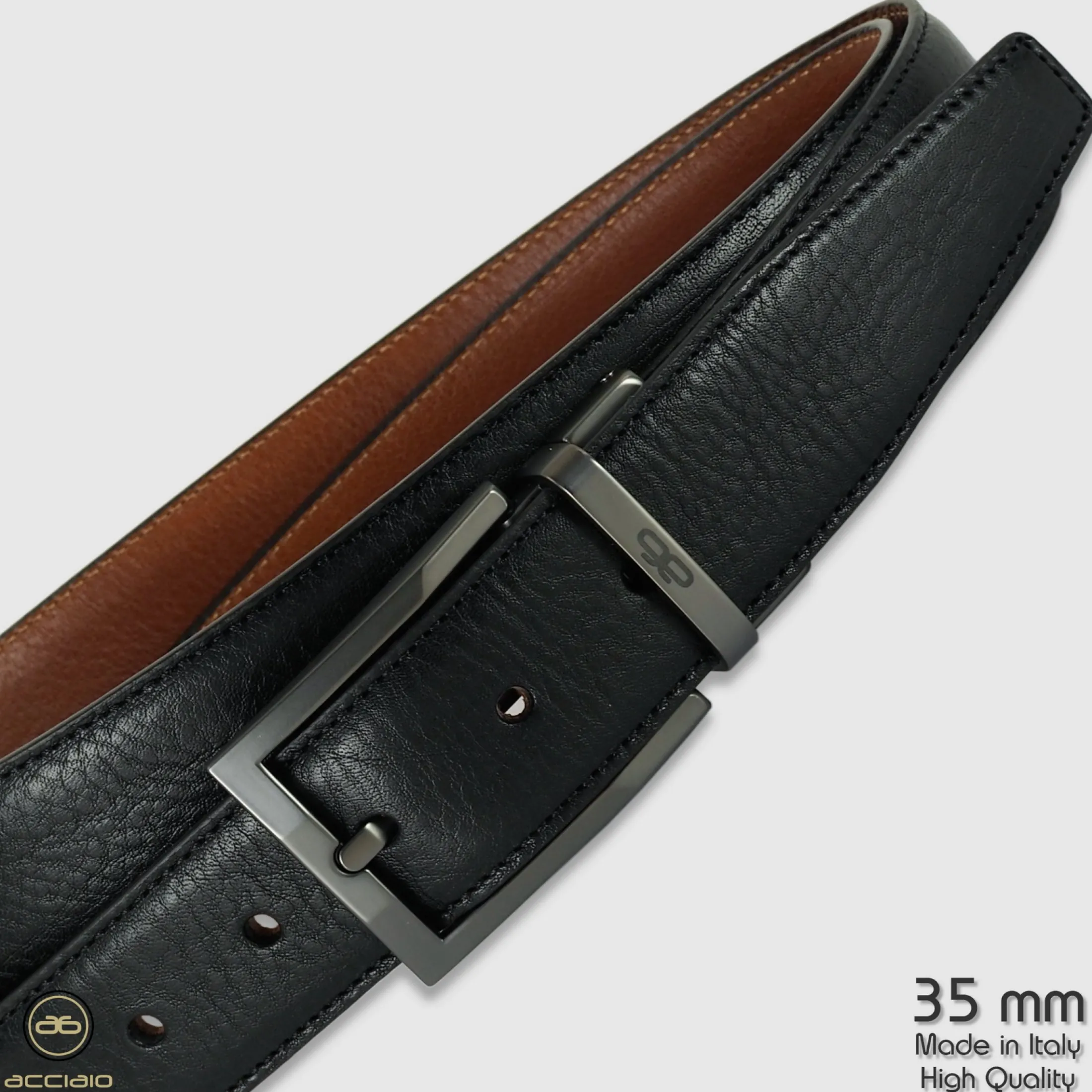 cintura_reversibile_uomo__3-1.webp Cintura reversibile uomo double face Emerald pelle Nero/Cognac